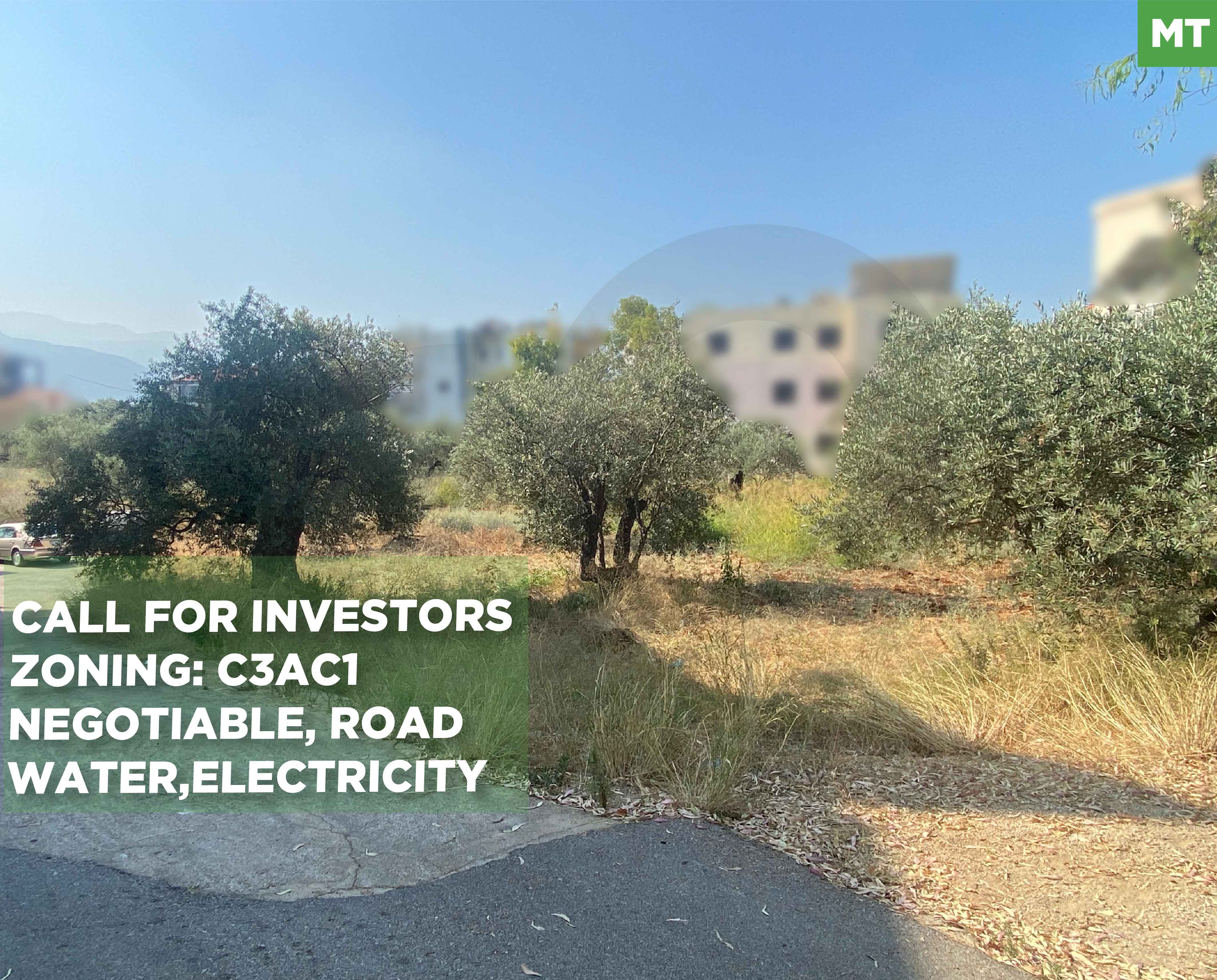 LAND/PRIME LOCATION/ideal for residential, commercial, or mixed-use/Zgharta-kferhata — الصورة 1