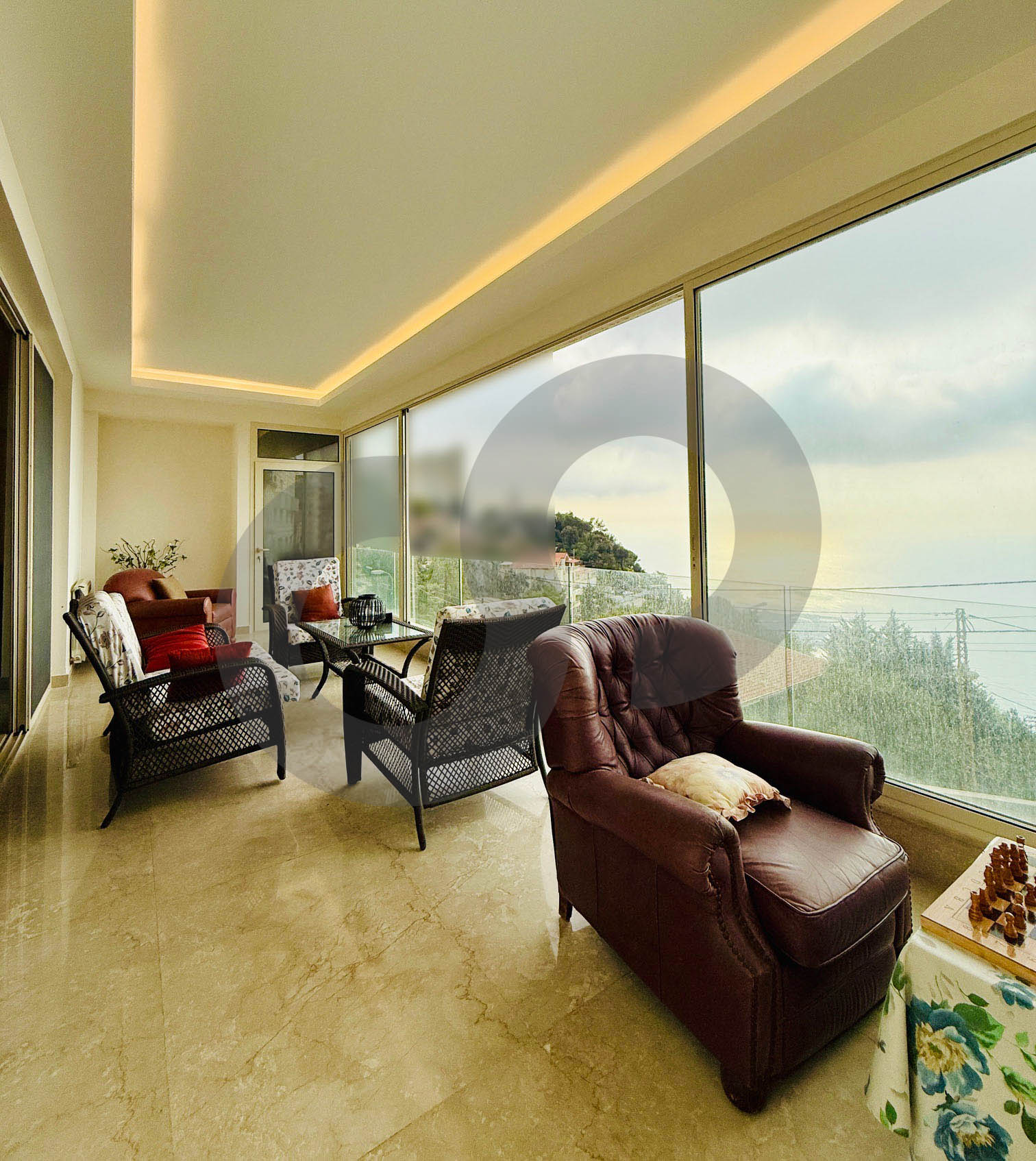 A 500 Sqm triplex apartment located in a brand new building in Harissa with full sea view over the khalij of Jounieh is now listed for rent with Confidence, • 3 Bedrooms (1 Master) • 5 Bathrooms • 2 Kitchens • Chimney • Salons • Balconies • 2 Undergroun — الصورة 3