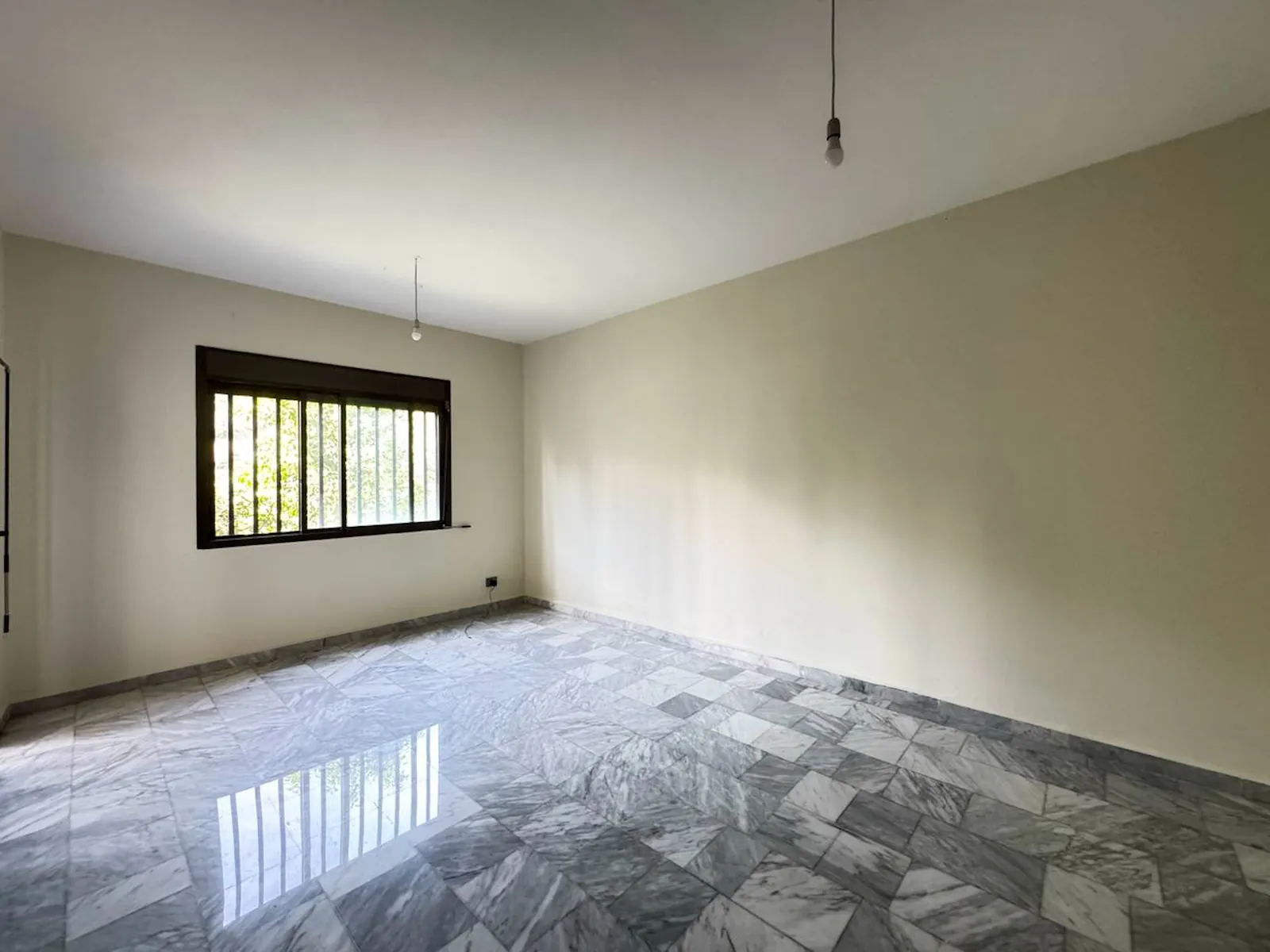Renovated Apartment in Aoukar, Metn with Terrace + Garden