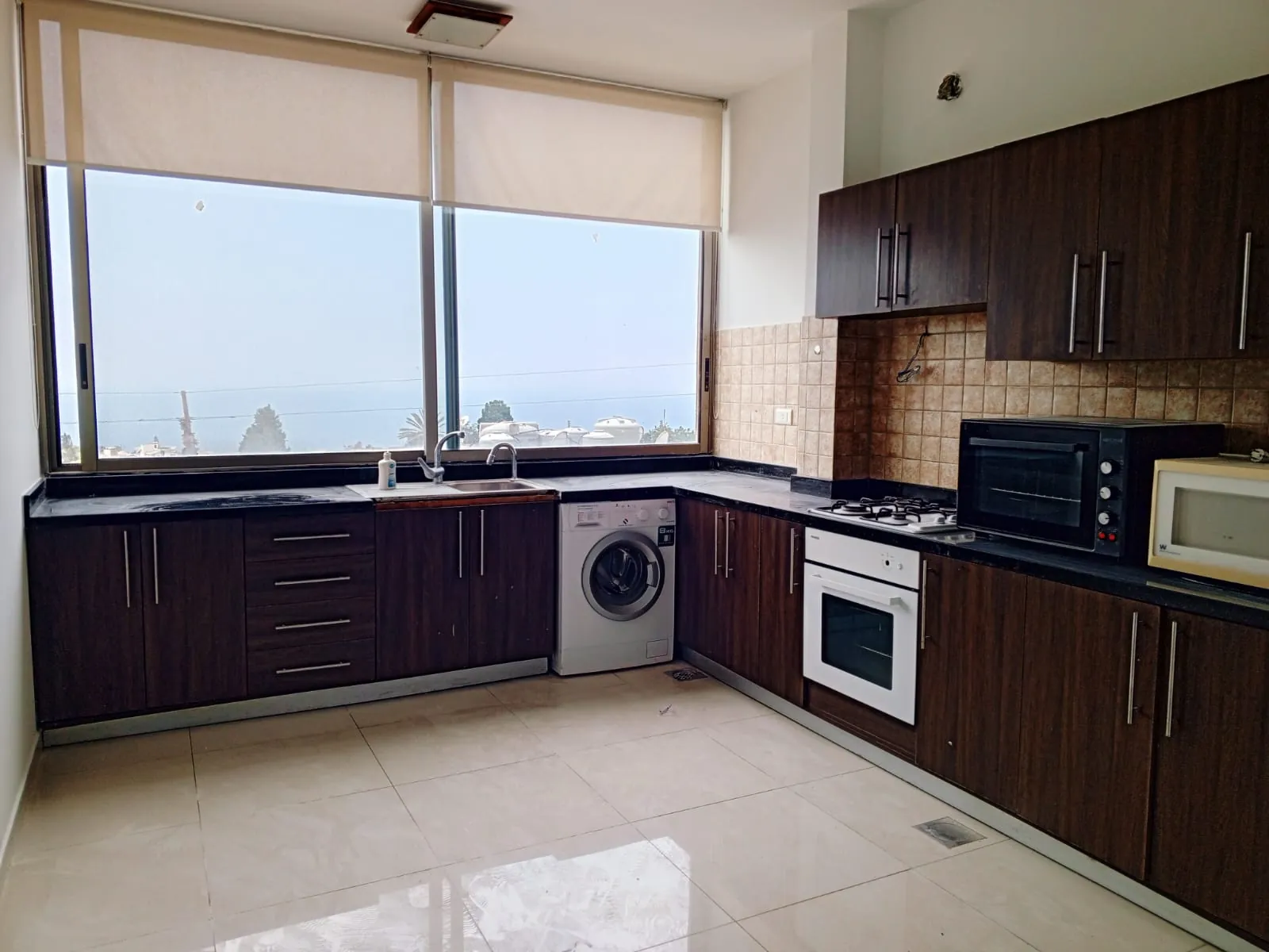 An Apartment With A Small Backyard For Sale in Jbeil — الصورة 4