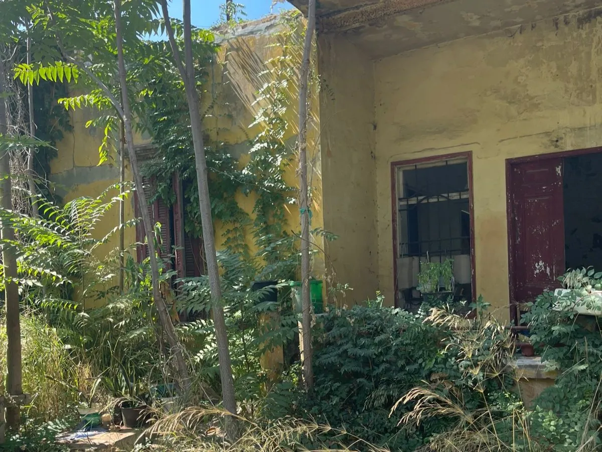 409 SQM Land with Old House For Sale in Karantina