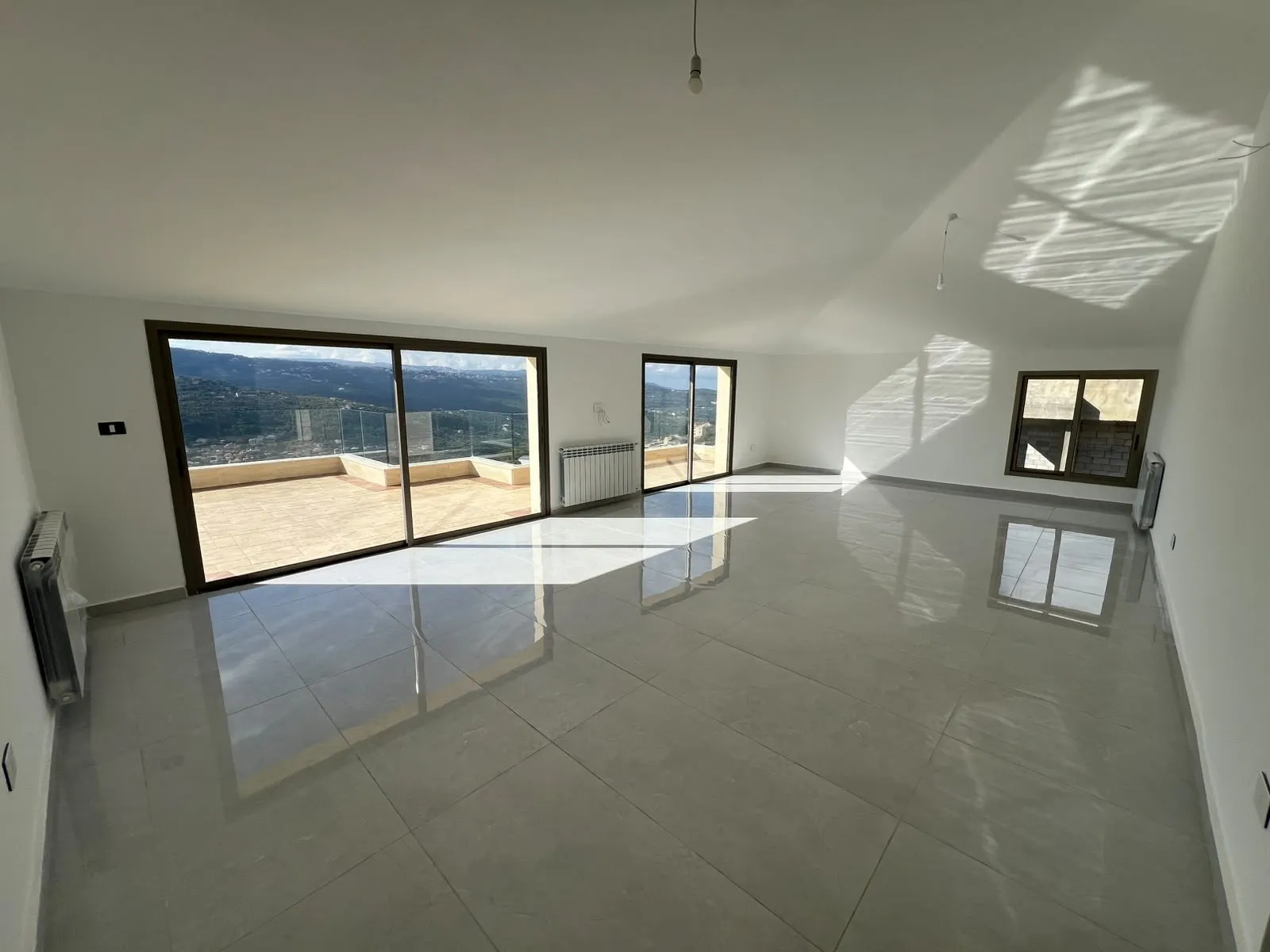 Brand New Roof Apartment with Terrace & Mountain View For Sale in Baabdat