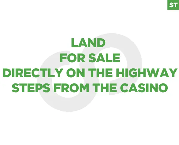 land in Adma located directly on the main highway