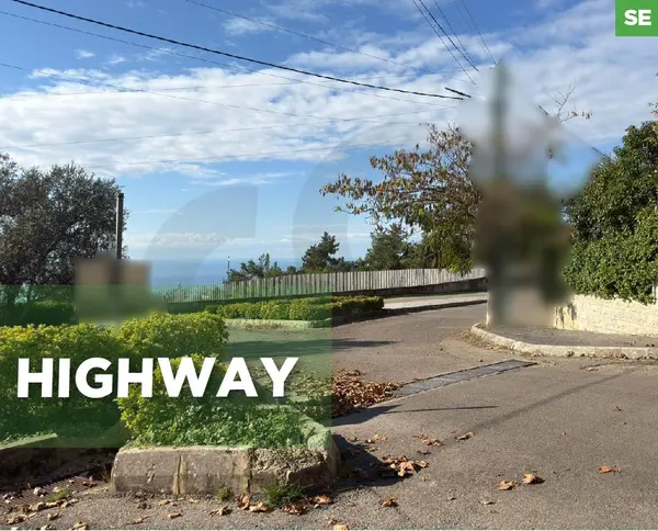 Flat Land Directly on the Ballouneh Highway–Prime Location