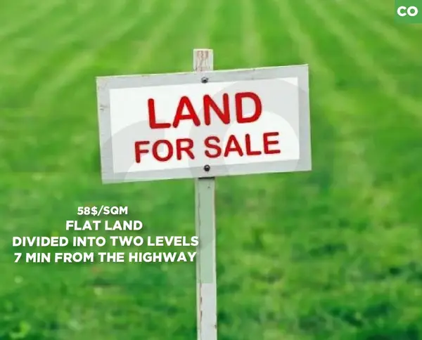 Flat land divided into two levels , Maaysra