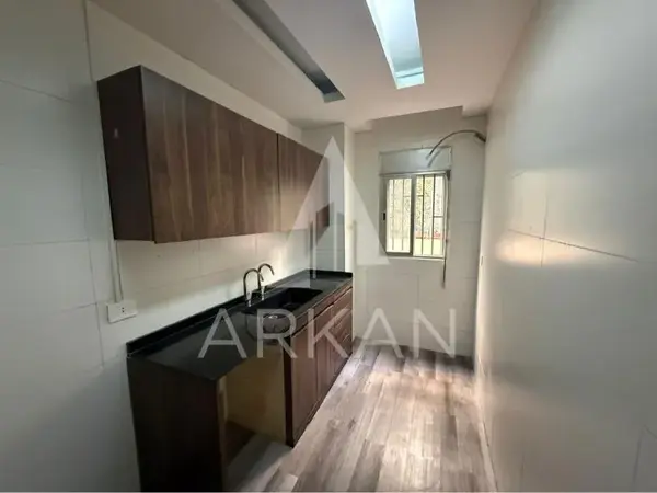 Apartment for Sale in Ballouneh | 70 sqm Ground Floor Apartment with Terrace