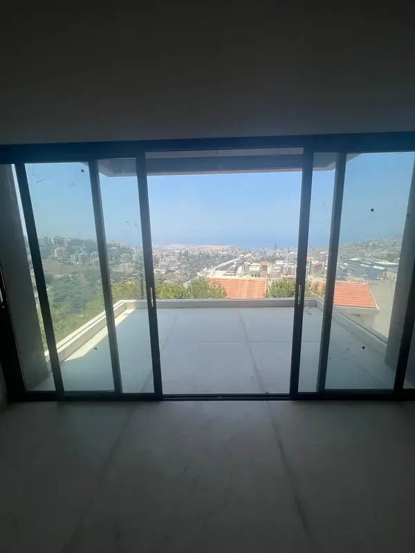 For Sale: Apartment in Tilal Ain Saadeh