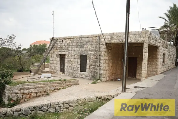 Land With Old House For Sale In Aamchit Jbeil